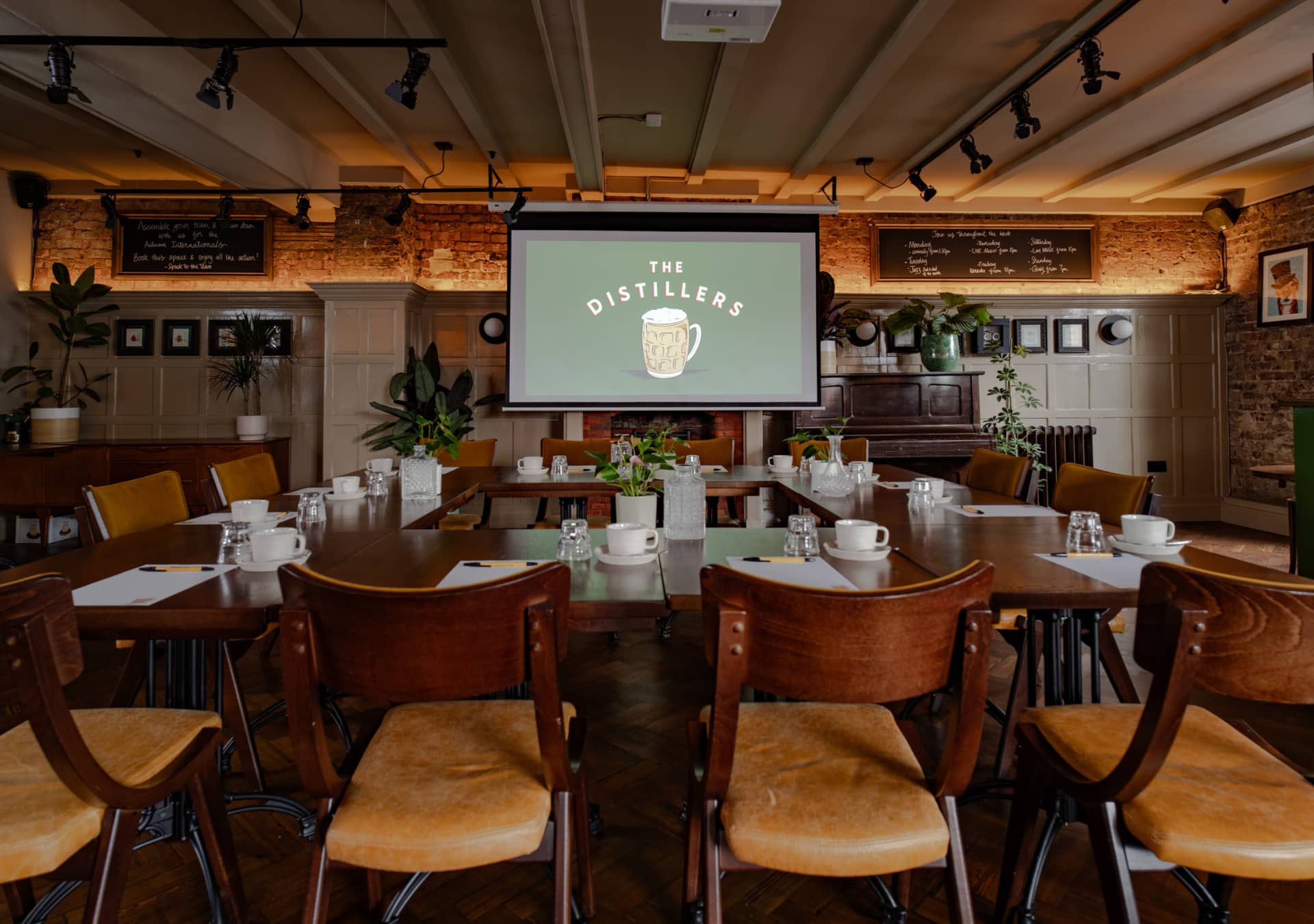 Meeting room set up with big screen